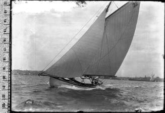 Sloop at sail with the number '32' on the mainsail, Sydney Harbour