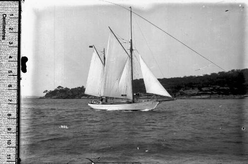 Ketch sailing near shoreline, Sydney Harbour