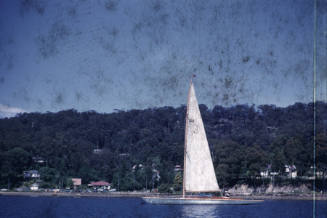 Sailboat SKYE at mooring with the mainsail raised