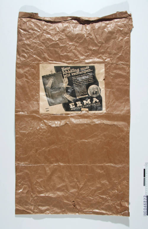 Protective paper cover 'Erma Mottenschutzsack' found inside schrank-koffer 00028297