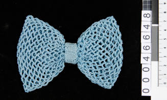 Crocheted bow with pin