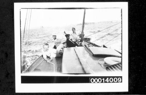 View of four people in UTIEKAH II, Sydney Harbour