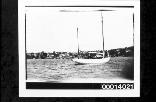 Starboard view of unknown ketch at anchor