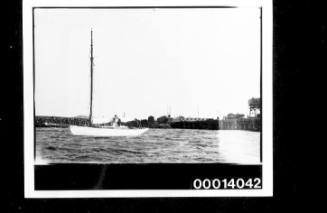 Yacht moored near breakwater