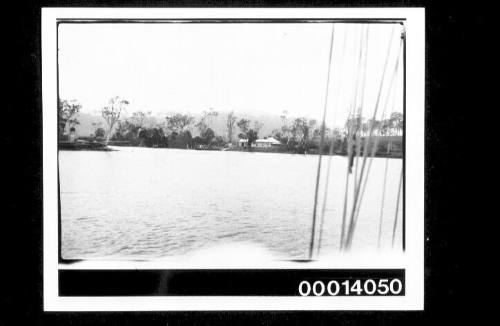 View of river waters and shore from a vessel