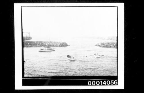 Vessels in a small breakwater harbour