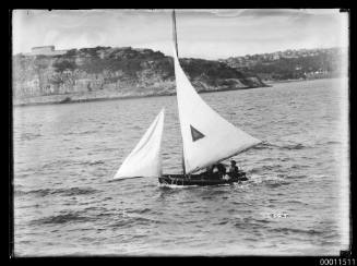 A small skiff sailing off Ball's Head, Sydney Harbour