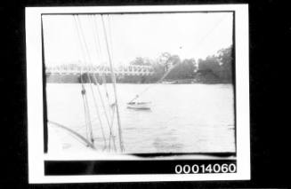 View of a bridge from the deck of a vessel, possibly the Nowra Bridge