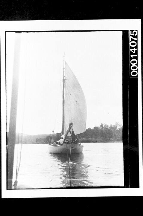 Stern of yacht UTIEKAH II as seen from a vessel under tow