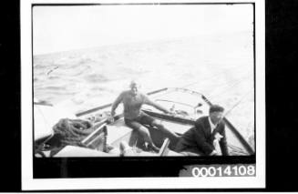 Crew of UTIEKAH II under sail at sea