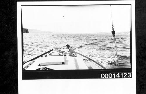 View of stern deck and cockpit of UTIEKAH II leaving the coast