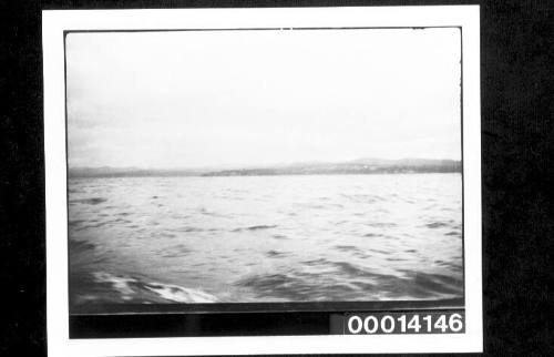 View of land from vessel under sail