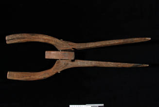 Yoke of boom, two pieces of curved wood with two holes in each