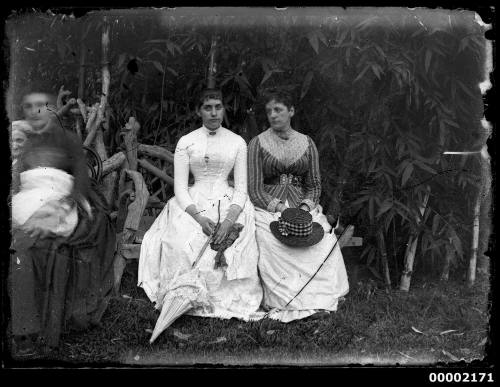 Portrait of two women, seated