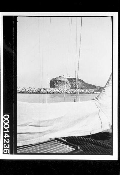 View from yacht of Nobbys Head and breakwater, Newcastle