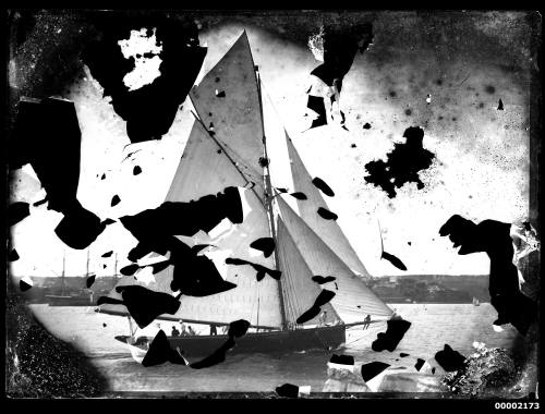 Badly damaged image taken from the starboard side of a yacht with seven crew visible