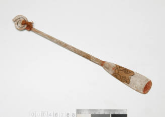 Wooden paddle from model of five-part outrigger canoe
