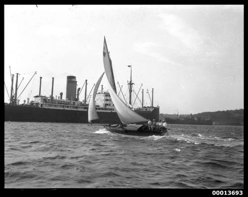 Amateur class yacht, A38, sailing past an ocean liner, Sydney Harbour