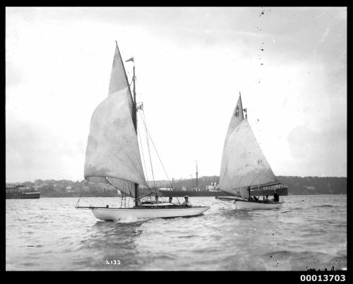 Two amateur class yachts sailing on Sydney Harbour