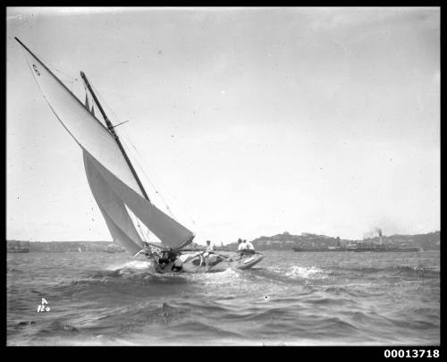 Stern of a sloop with 6 on sail