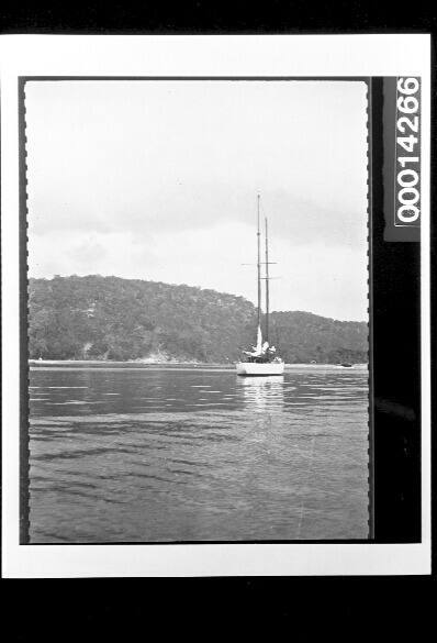 Two masted yacht moored on calm waters