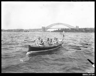 Rowboat on Sydney Harbour with Sydney Harbour Bridge in the background
