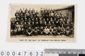 Postcard photograph showing prisoners at German prison camp during World War II