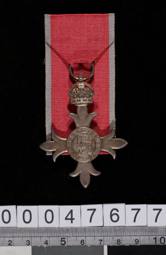 Member of the British Empire medal awarded to T W Ellis of the merchant navy for bravery during WWII