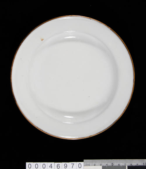 White enamelled dinner plate