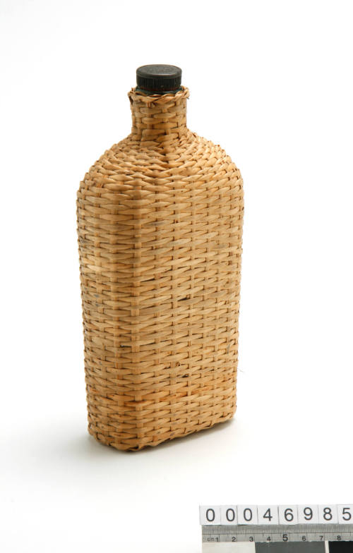 Glass bottle with wicker case