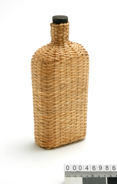 Glass bottle with wicker case