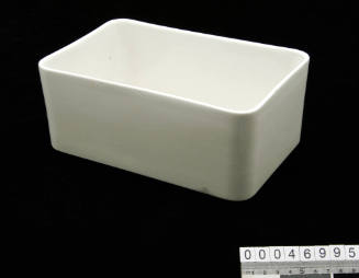 White ceramic and metal storage container
