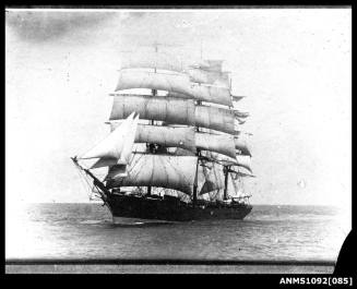 Three-masted, fully-rigged ship underway