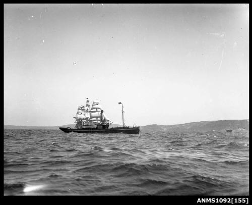 Tugboat WARATAH passing training ship JOSEPH CONRAD in Sydney Harbour