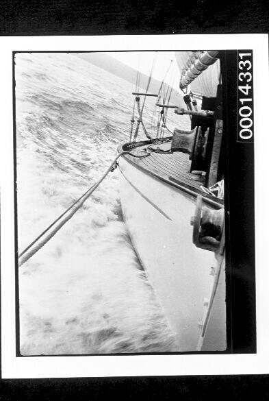 View of yacht SIRIUS taken from bowsprit, looking aft on starboard side