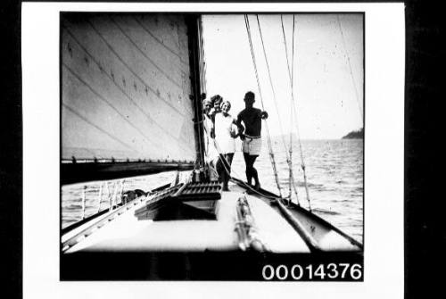 Young women and men on the deck of a yacht