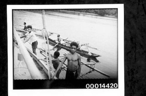 Papua New Guinean children meet the yacht SIRIUS on outrigger canoes, Rabaul