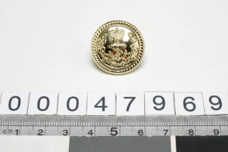 RAN officer's uniform button with manufacturer GAUNT B'HAM inscribed verso