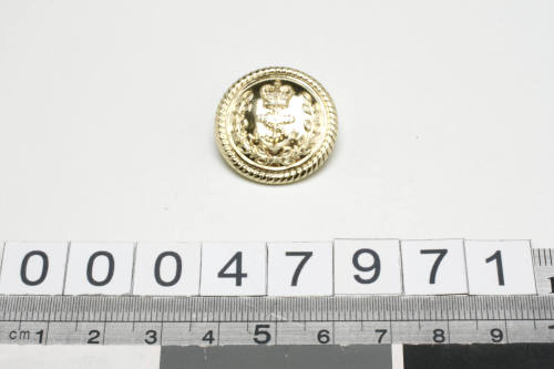 RAN officer's uniform button with manufacturer GAUNT B'HAM inscribed verso