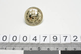 RAN officer's uniform button with manufacturer GAUNT B'HAM inscribed verso