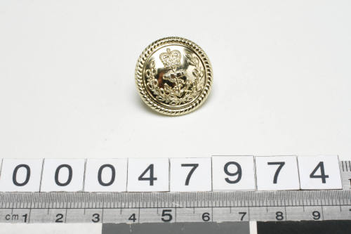 RAN officer's uniform button with manufacturer GAUNT B'HAM inscribed verso