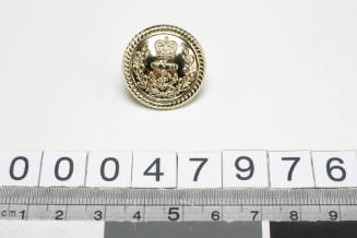 RAN officer's uniform button with manufacturer GAUNT B'HAM inscribed verso