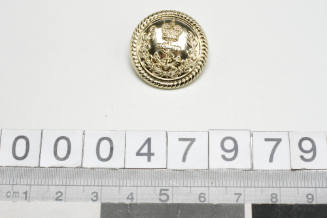 RAN officer's uniform button with manufacturer GAUNT B'HAM inscribed verso