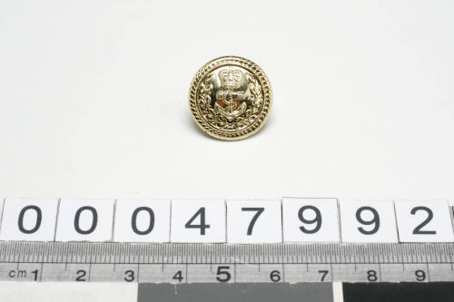 RAN officer's uniform button with manufacturer GAUNT B'HAM inscribed verso