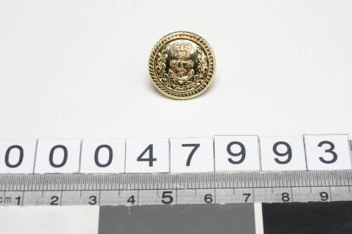 RAN officer's uniform button with manufacturer GAUNT B'HAM inscribed verso