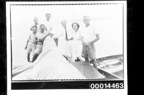 The Nossiters on deck of yacht SIRIUS with guests, Pulau Langkawi, Malaya