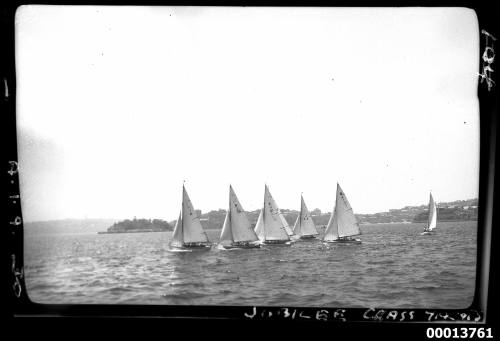 Seven Jubilee class yachts racing on Sydney Harbour