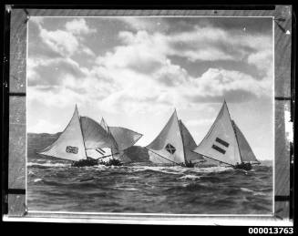 18-foot skiffs including AUSTRALIA, MASCOTTE and HC PRESS racing on Sydney Harbour