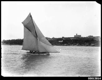 Gaff rigged yacht sailing past Manly