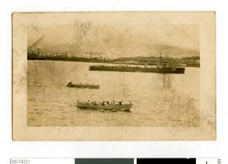 HMAS WARREGO with ship's boats racing